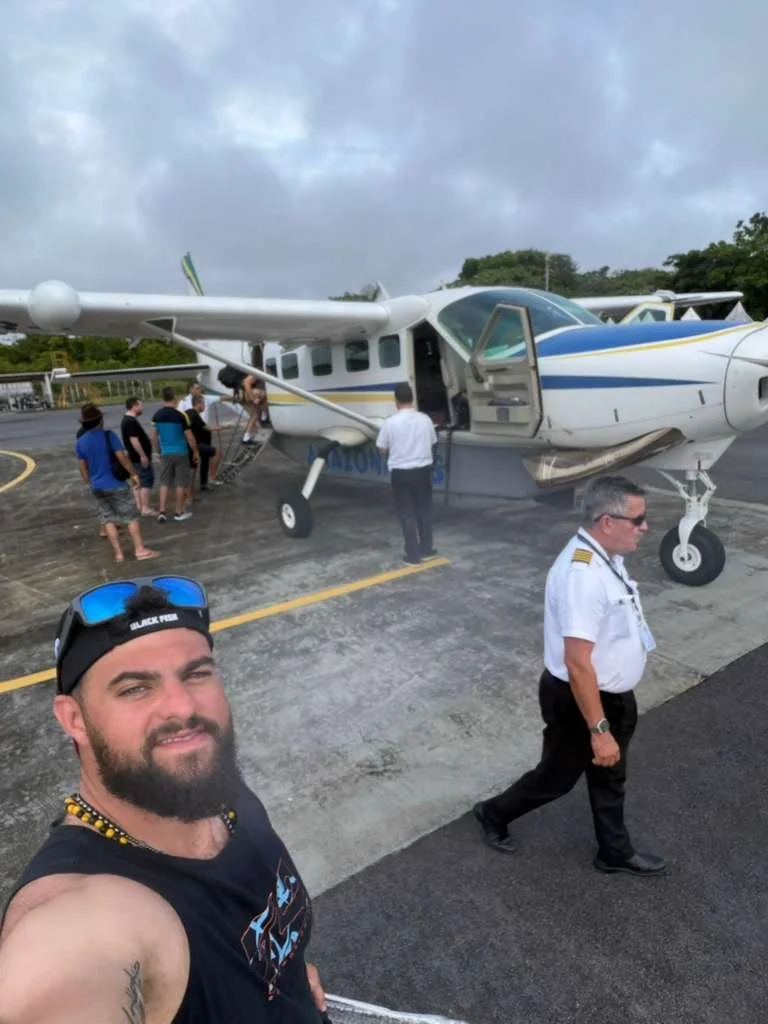 Boarding the private charter flight to Barcelos
